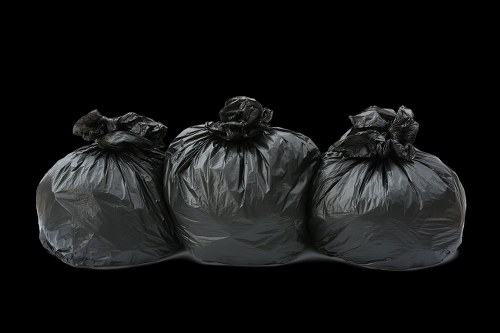 Business professionals managing waste in an office setting in Barking.