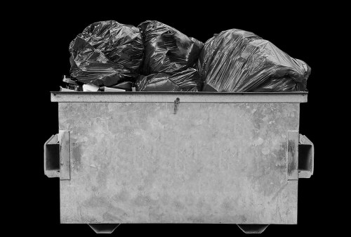 Van departing after commercial waste collection in Barking